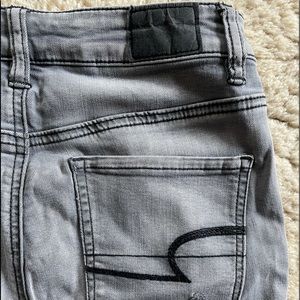 High-Rise & Ripped Grey Skinny Jean